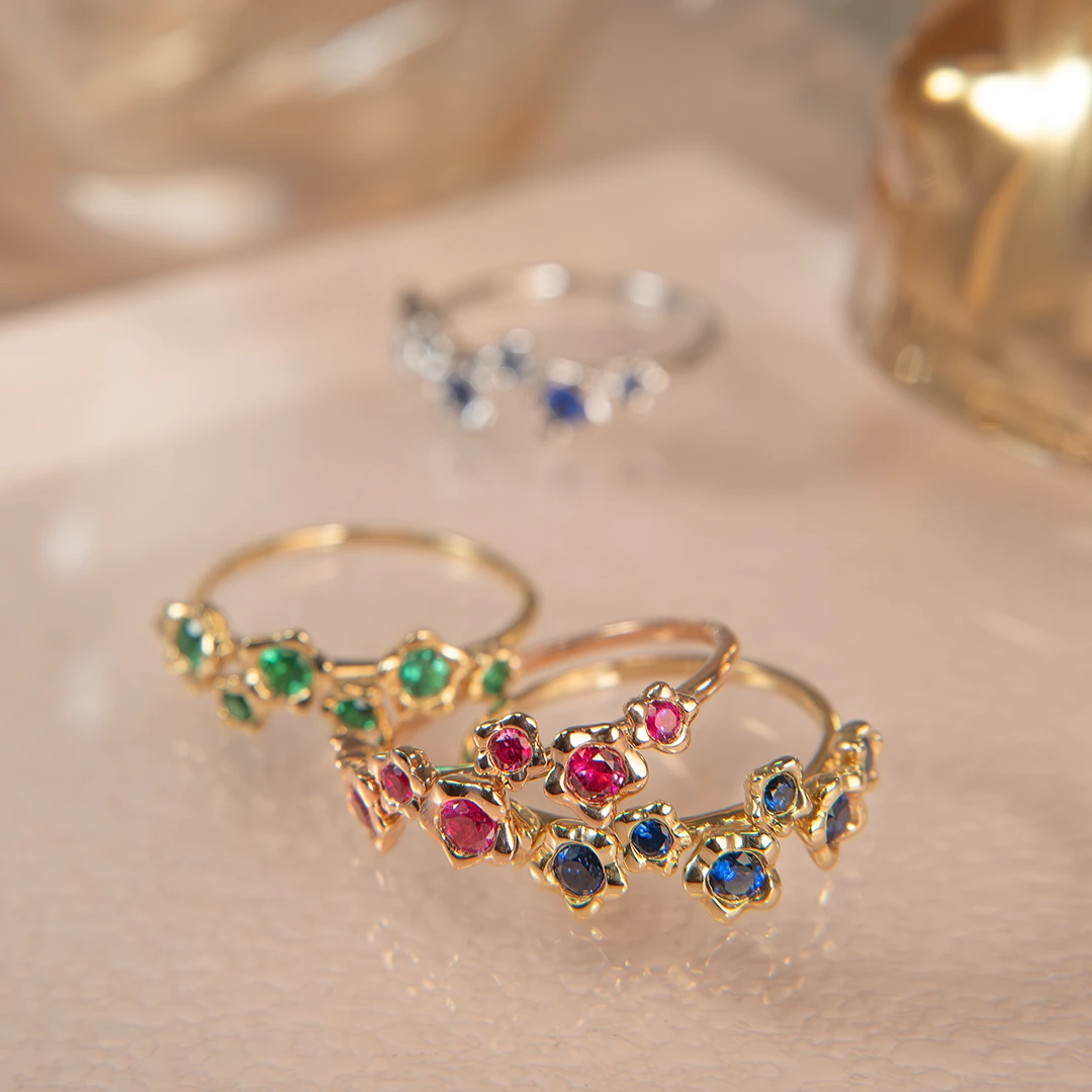 Melted gold petals blue sapphire ring